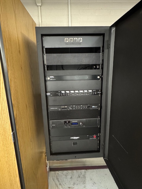 AV equipment rack installation inside a commercial facility