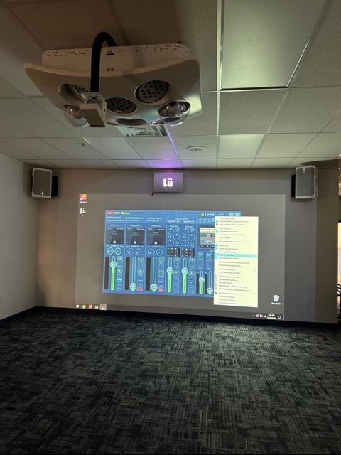 Commercial AV projector room with ceiling-mounted equipment