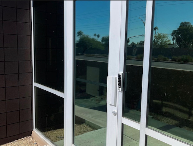 Commercial access control keypad installed at a building entry