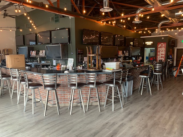 Restaurant bar with multiple TV displays installed for AV service